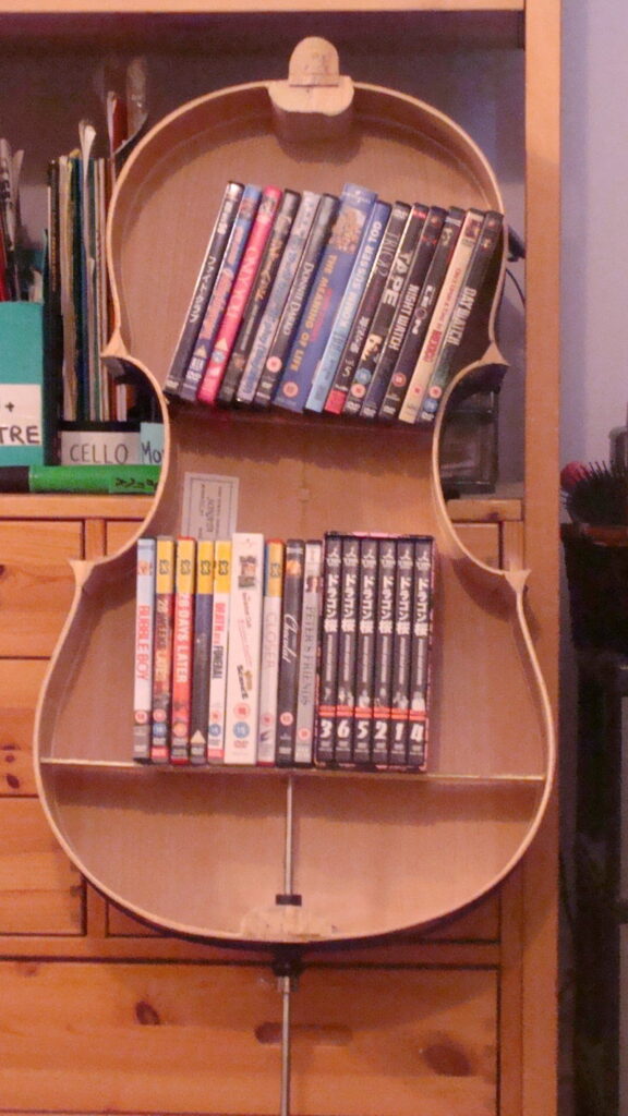 Violin Shape DVD Storage